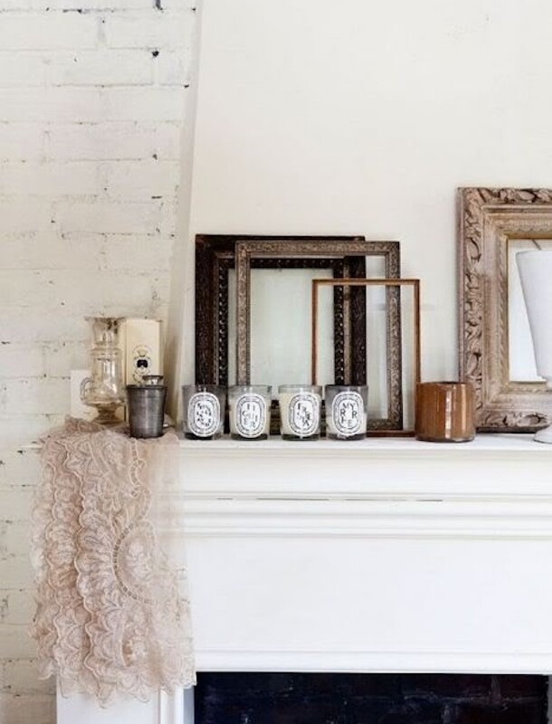mantle with diptyque candles | camille styles