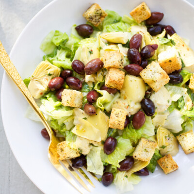 Chopped Salad with Marinated Artichoke Hearts, Kalamata Olives, Black Pepper Croutons and Emulsified Cucumber dressing