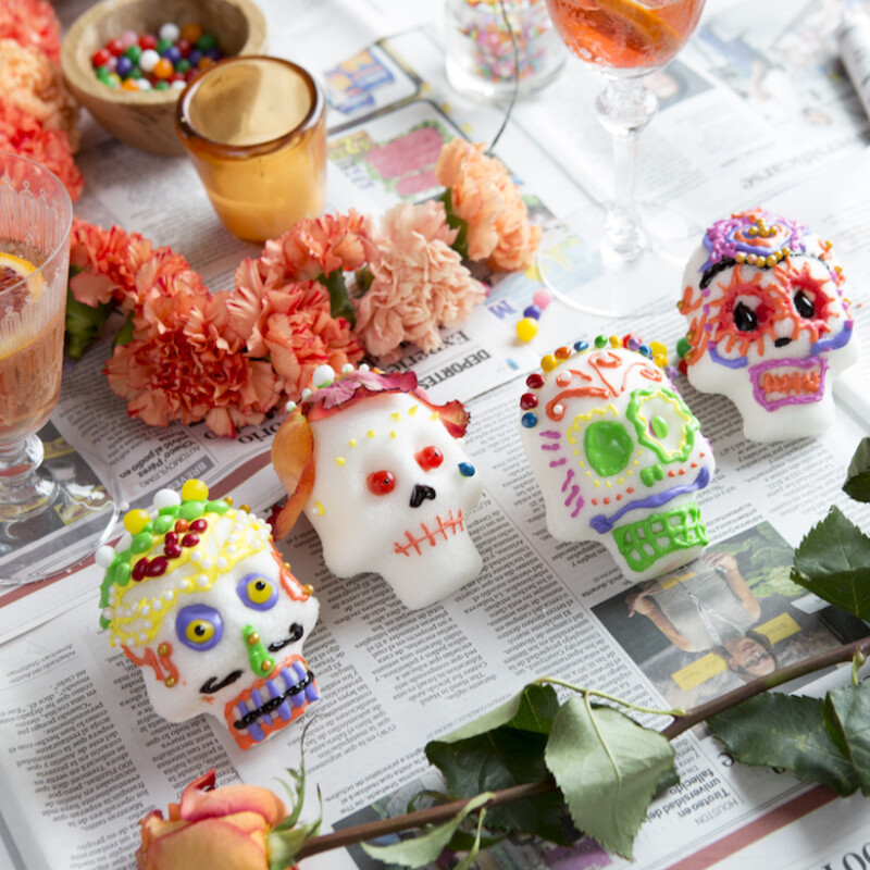 decorating sugar skulls for dia de los muertos