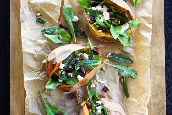 savory stuffed sweet potatoes on baking sheet