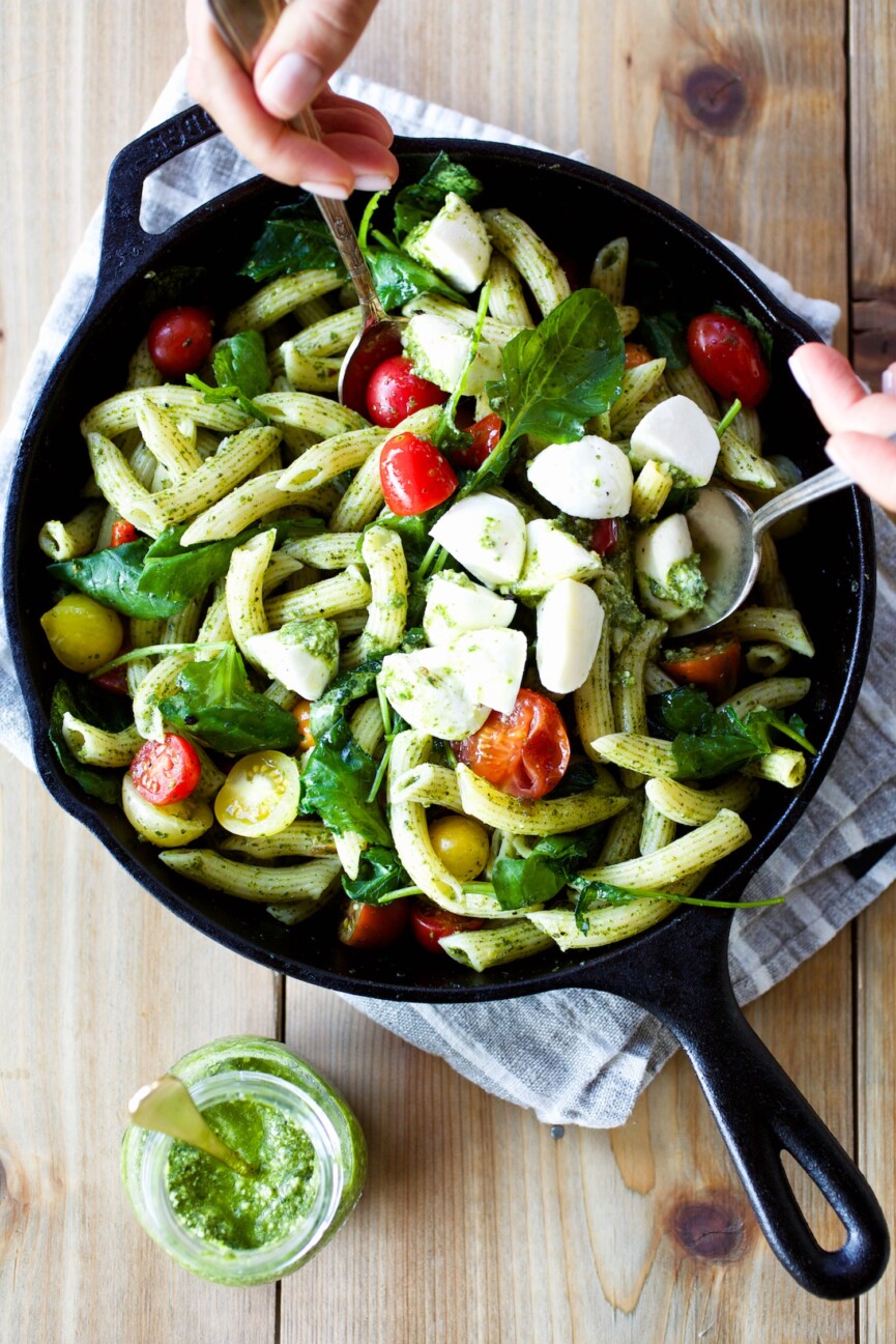 serving caprese pesto pasta