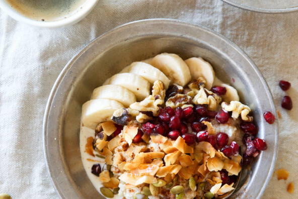 A Power Bowl to Start the Morning! Oatmeal Quinoa Breakfast Bowl Recipe with Bananas, Coconut, Pepitas, Pomegranate Seeds, Maple Syrup, & Cinnamon