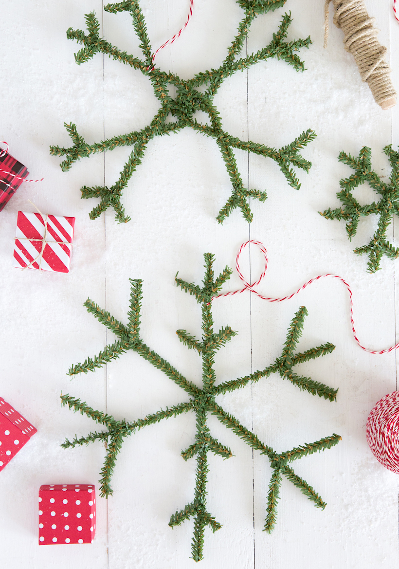 DIY snowflake wreath made with greenery pipe cleaners