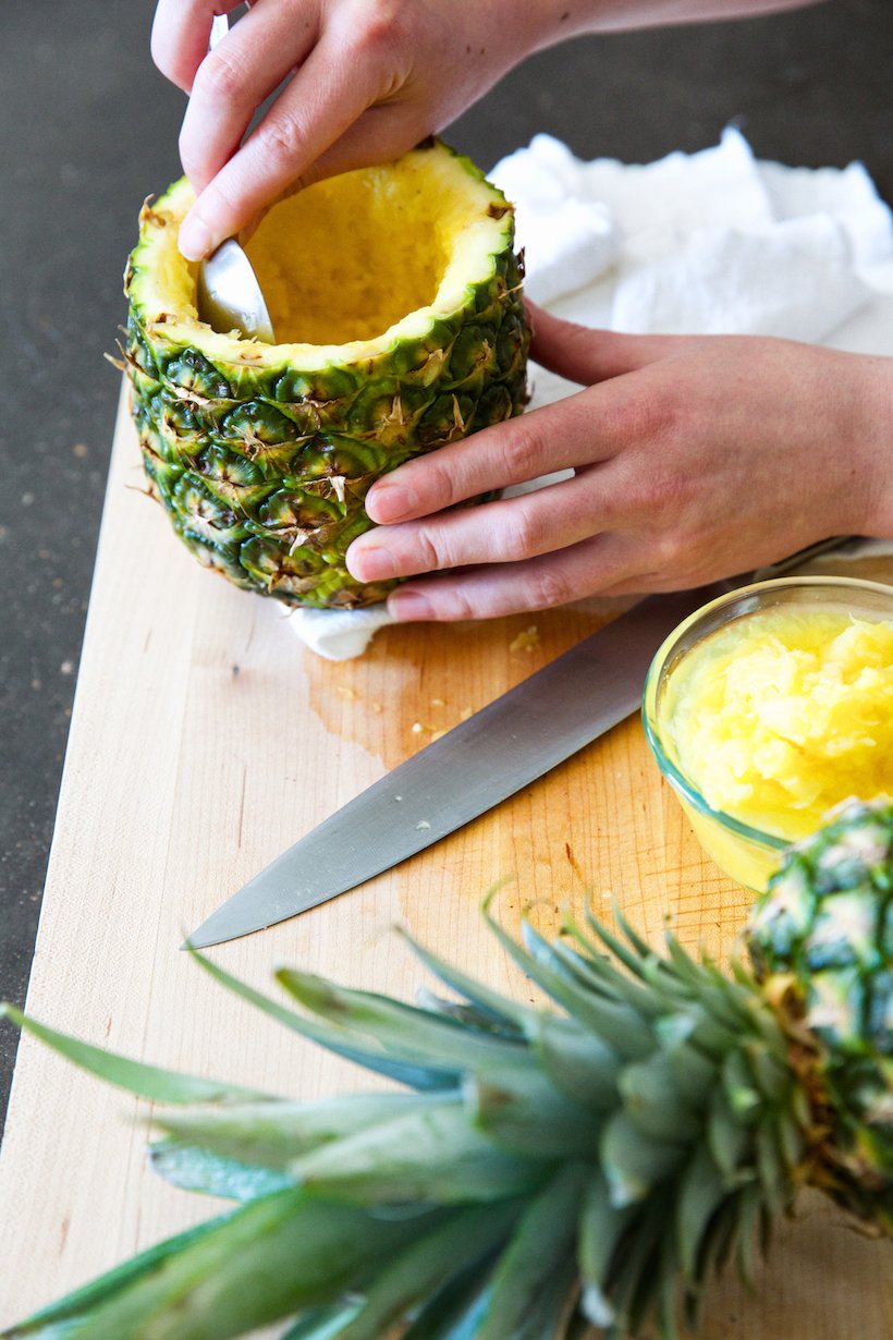 scoop out the inside of a pineapple to make a show-stopping vessel for a tropical cocktail!
