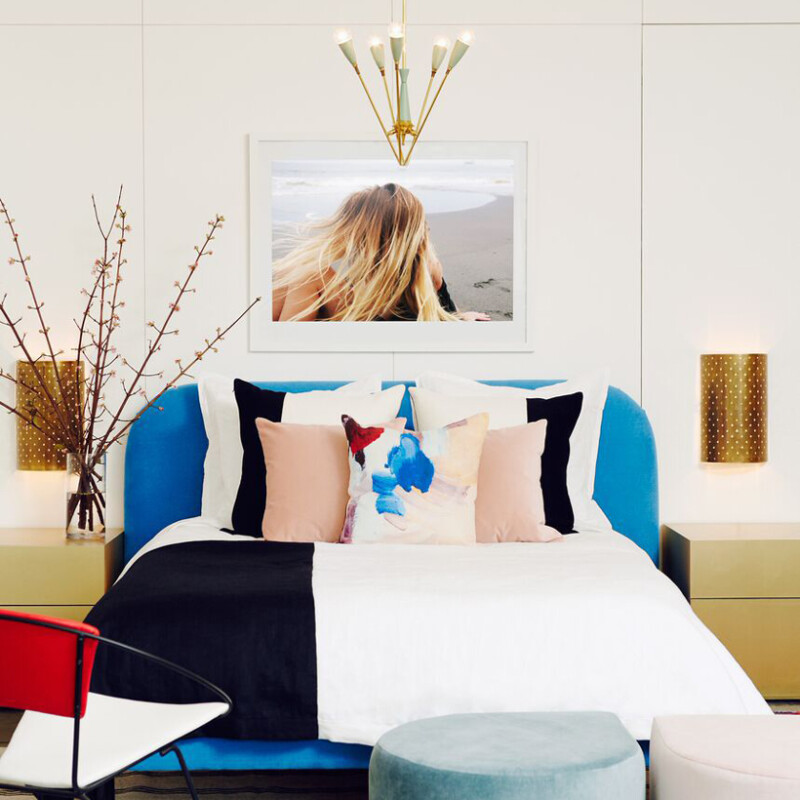 Bold modern decor and home accessories for a one bedroom using primary colors