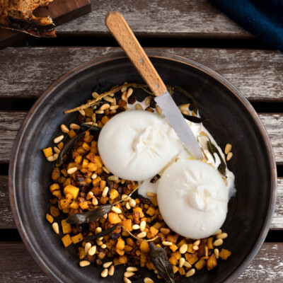 Burrata with Caramelized Squash, Pine Nuts and Golden Raisins