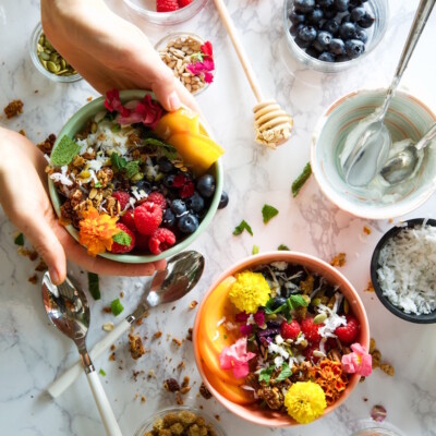 gluten-free coconut pecan granola with yogurt & berries