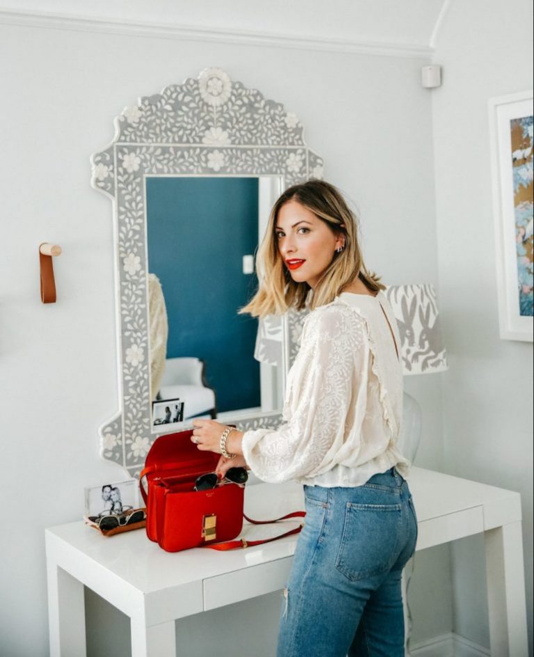 emily schhuman, home decor, red purse, red lipstick