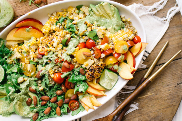 This southwestern superfood salad is bursting with tomatoes, peaches, and all my other favorite flavors of summer!