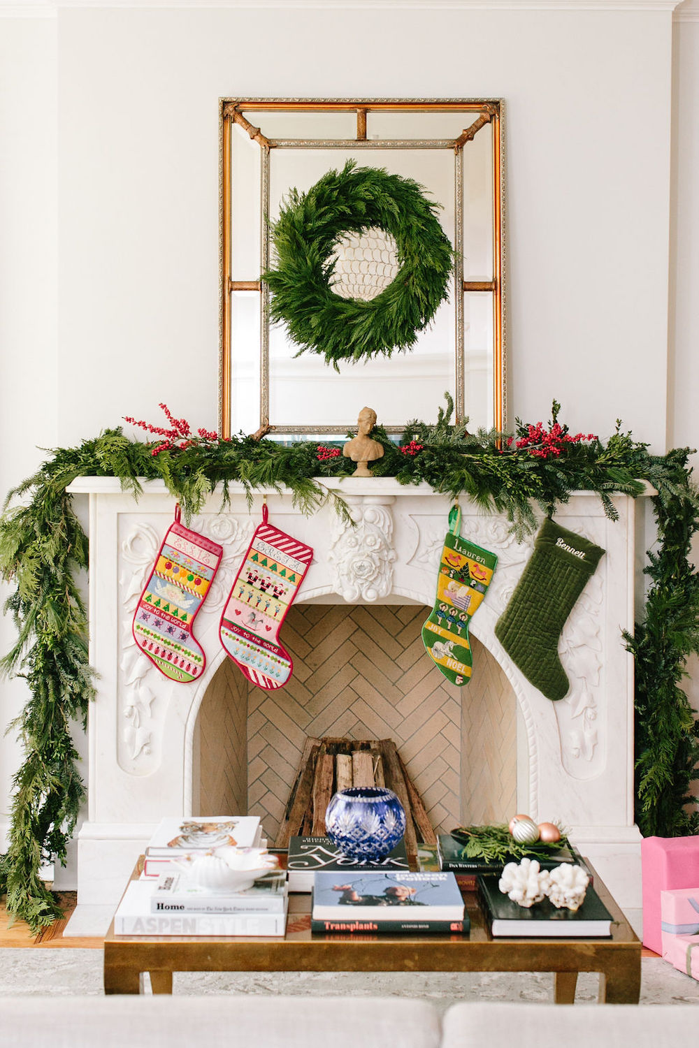 stone mantle with holiday decor and stockings