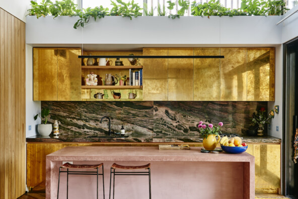 Alex Van Der Sluys's striking kitchen with stone, brass and pink