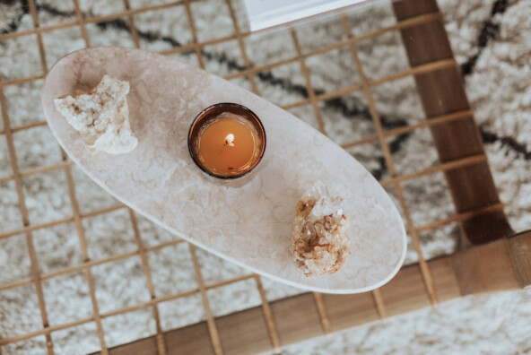 all the scents i use to guide me throughout the day, candles, crystal, perfume, neutral living room