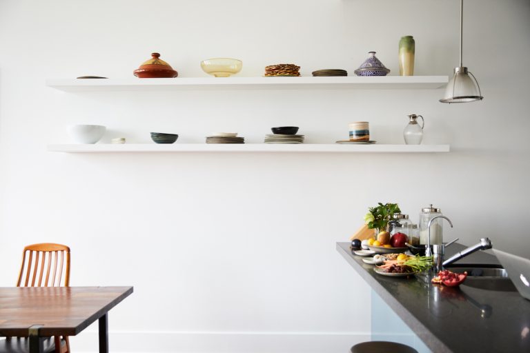 minimal white floating shelves