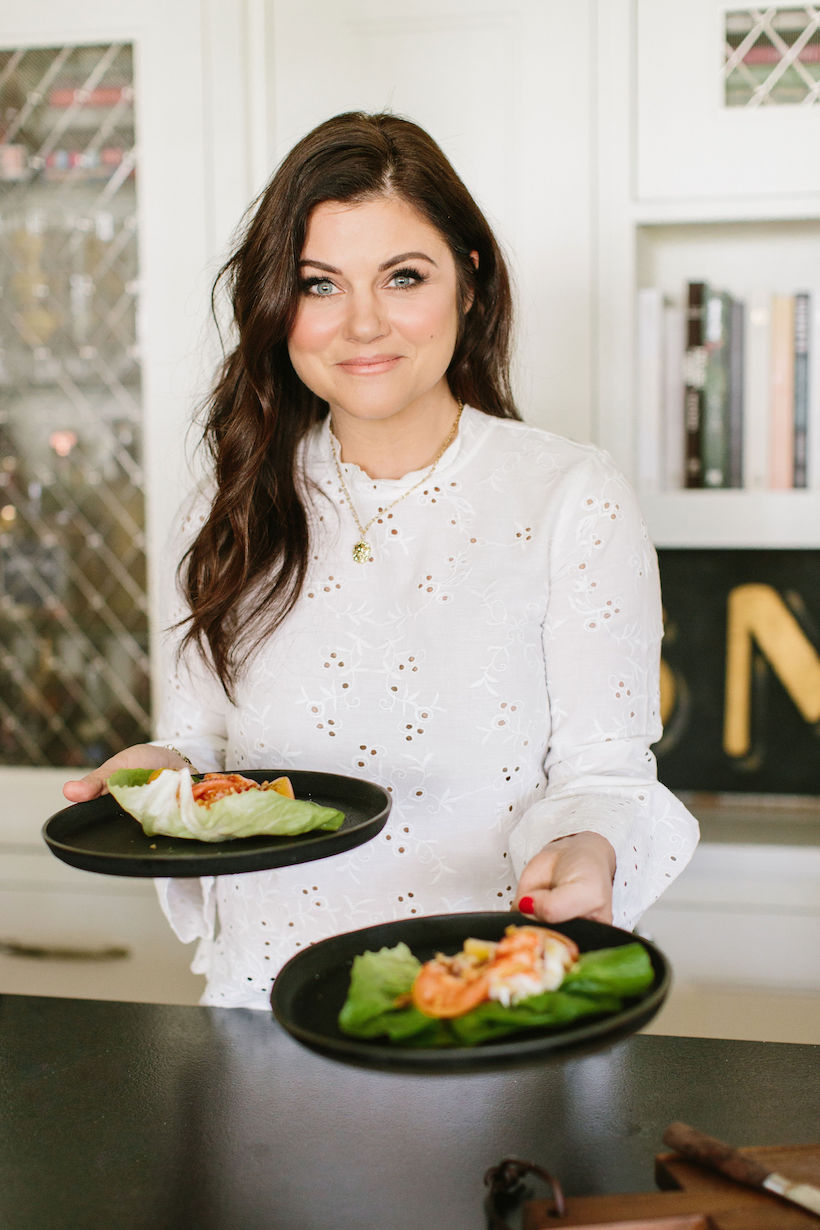 Tiffany Thiessen at home in LA cooking from her cookbook
