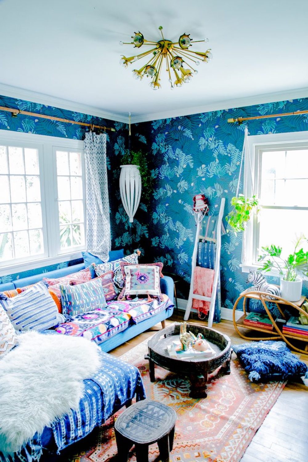justina blakeney's living room with wallpaper
