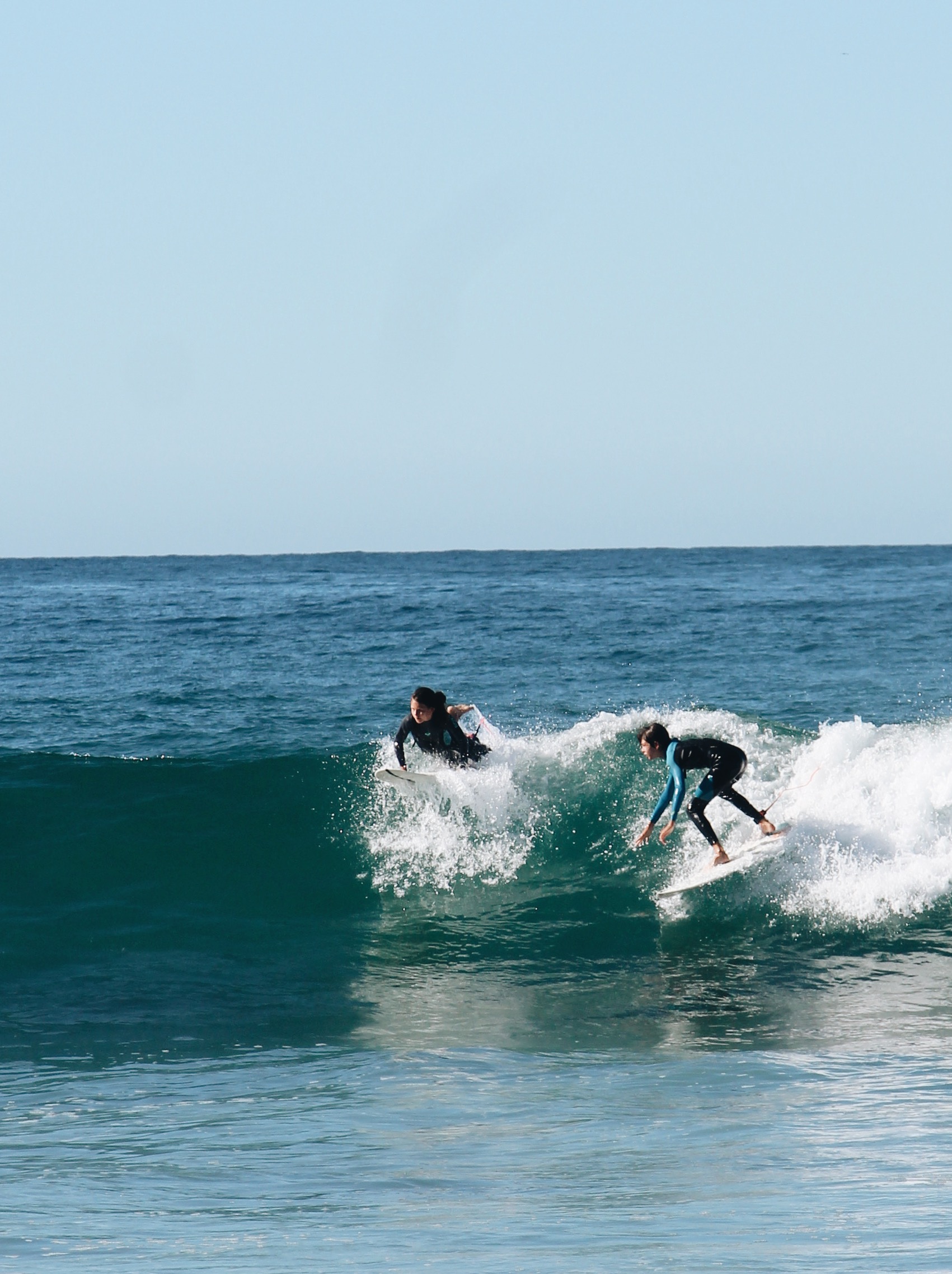 Sean Hughes and Juliet Hughes surfing in La Pastora
