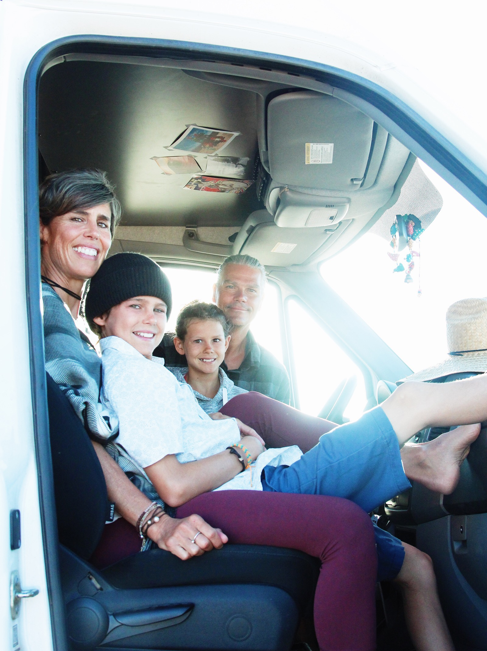 Ian Hughes, Melanie Roberge, Sean Hughes and Juliet Hughes in their Sprinter Van