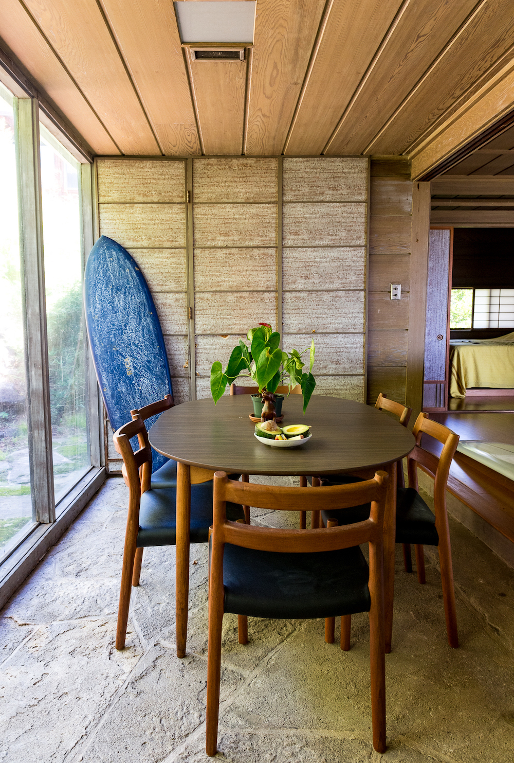 a mid century dining room in a hawaii home