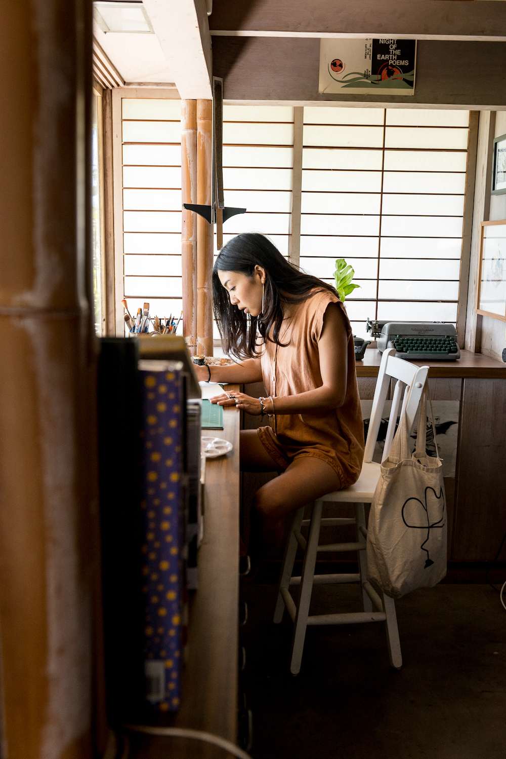 artist jordan higa working in her home studio in hawaii 