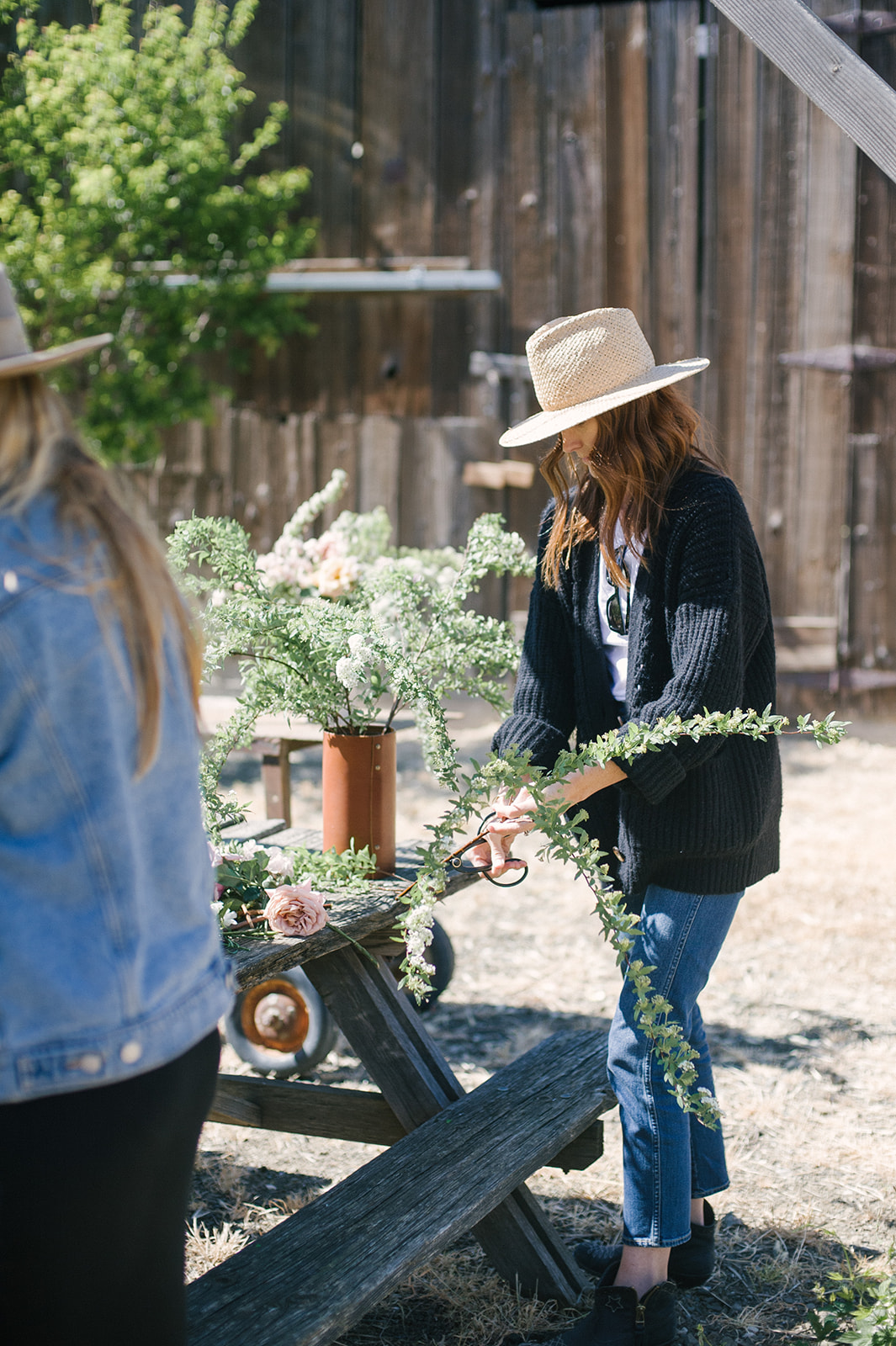 Jenni Kayne Retreat, florals, woman, hat, outdoors