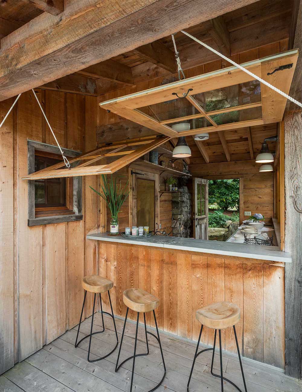 rustic outdoor kitchen with bar