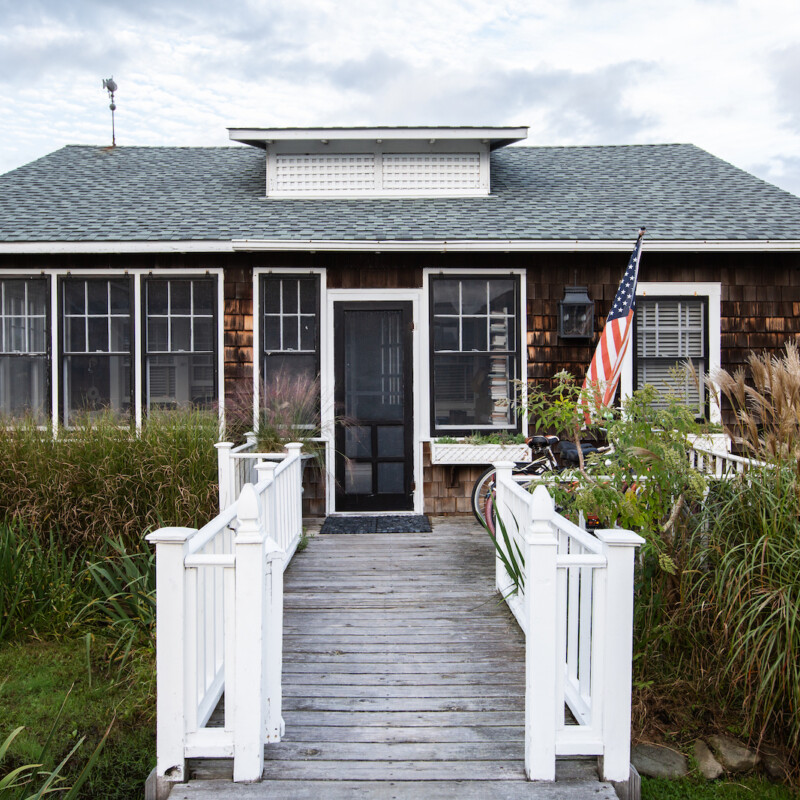 fire island coastal cottage with shingles and classic exterior