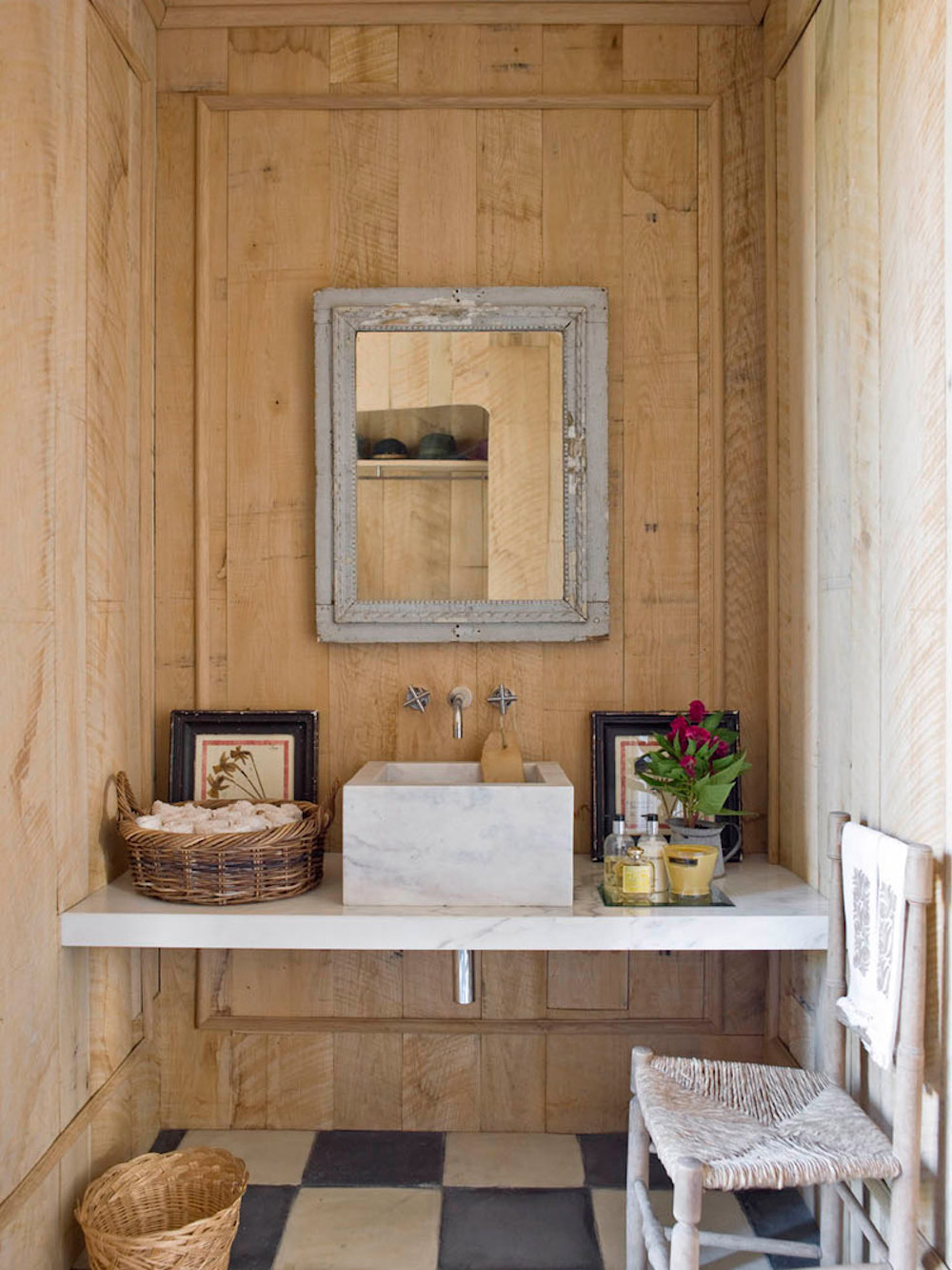 rustic powder room with black and white checkered floors
