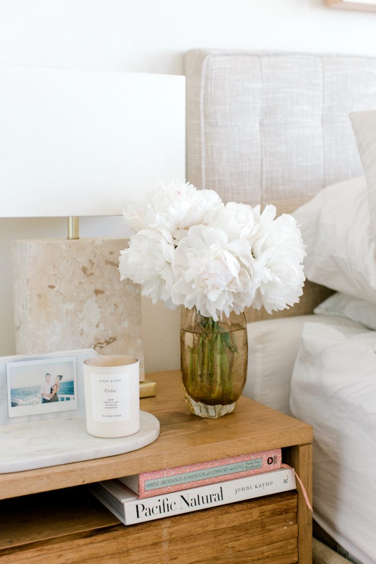 Camille Styles bedroom with white peonies