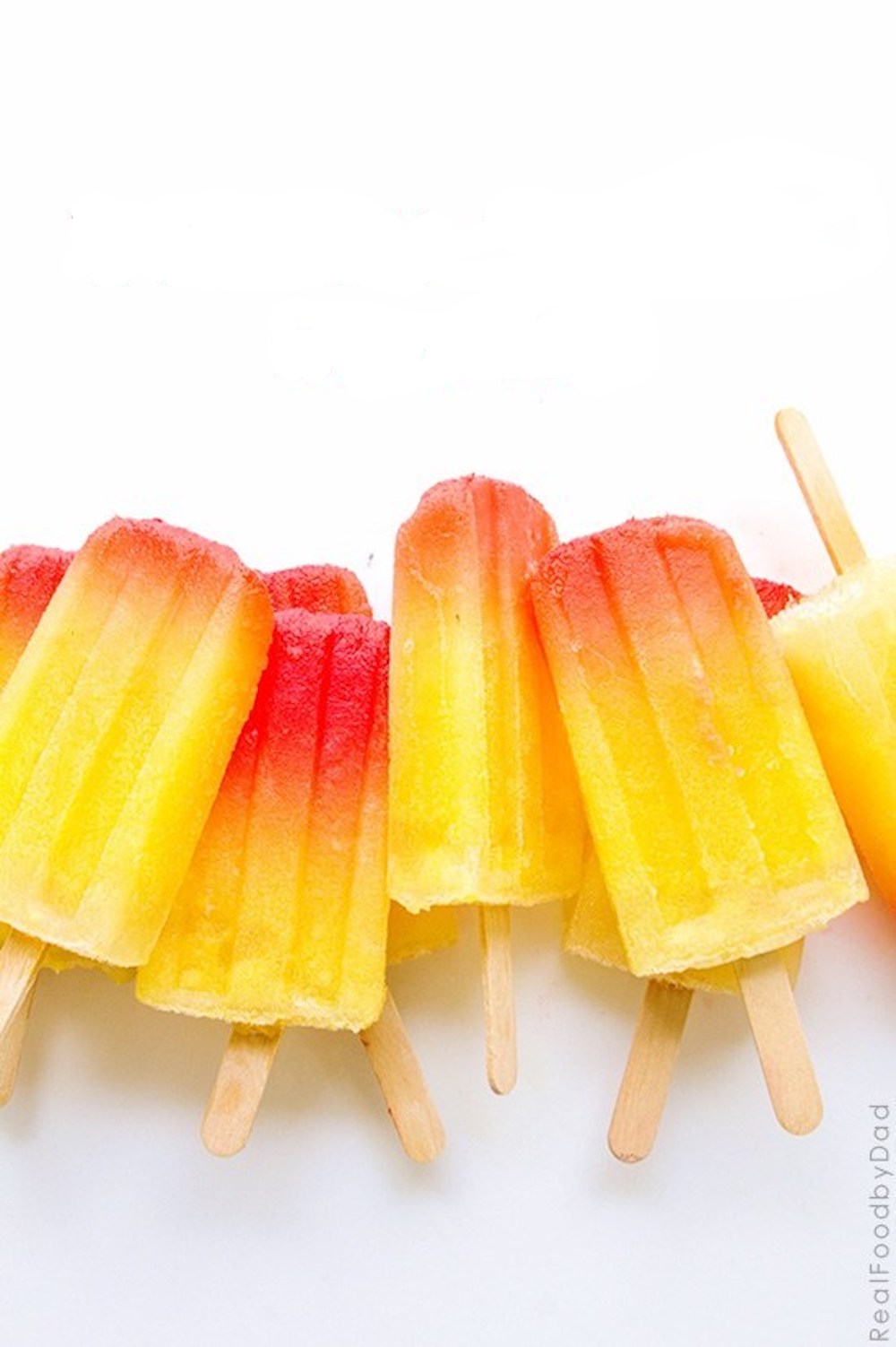 boozy popsicles, tropical tequila sunrise popsicles