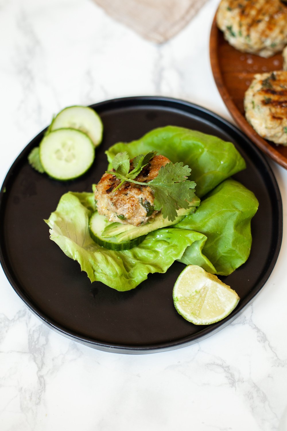 easy recipe for an Asian Spiecd Chicken Burger in a Lettuce Wrap gluten free, paleo, whole 30