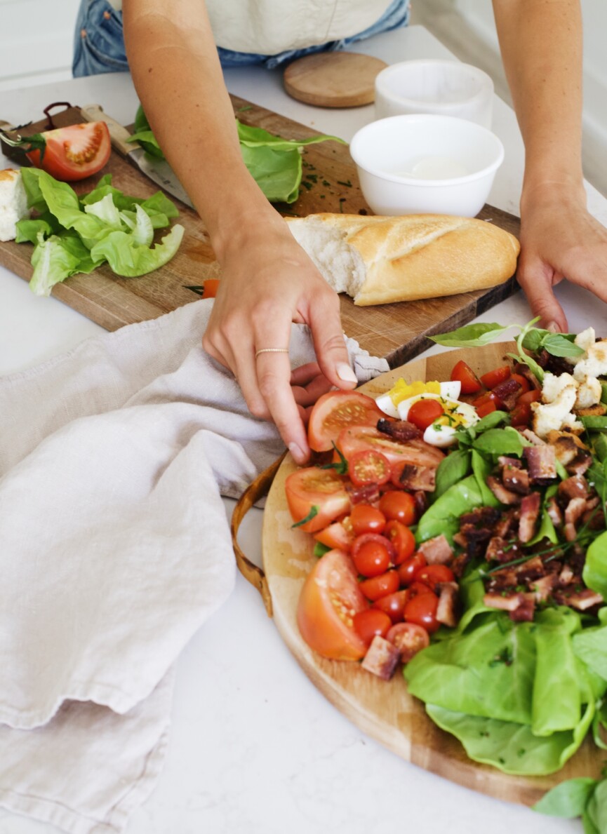 assembling BLT salad board