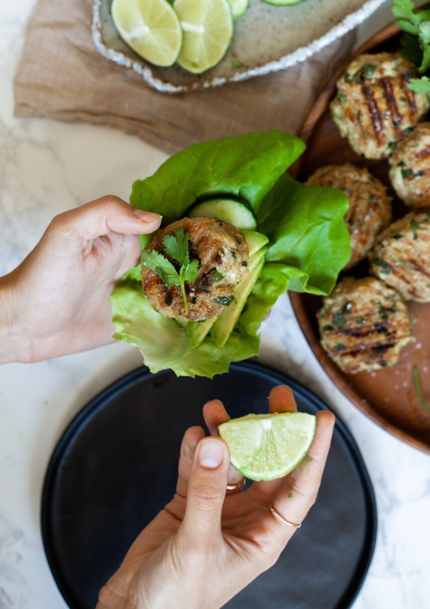 assembling chicken burger lettuce wraps