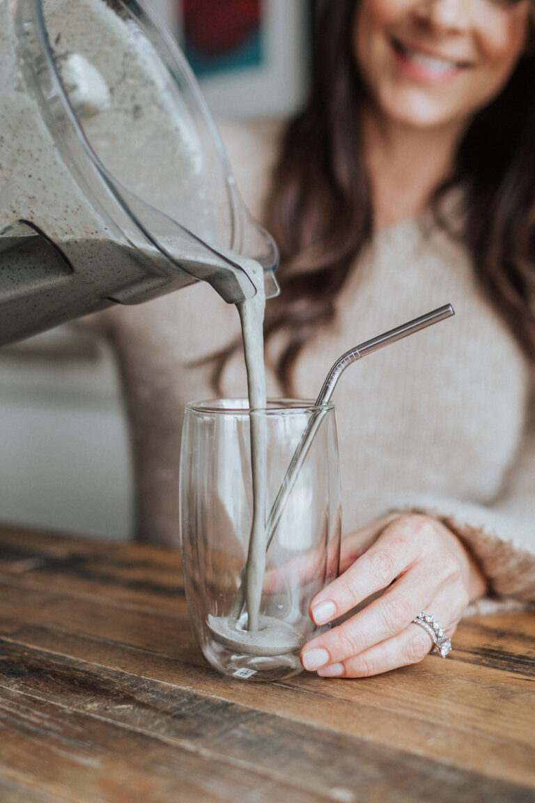 Kelly LeVeque pours a protein smoothie