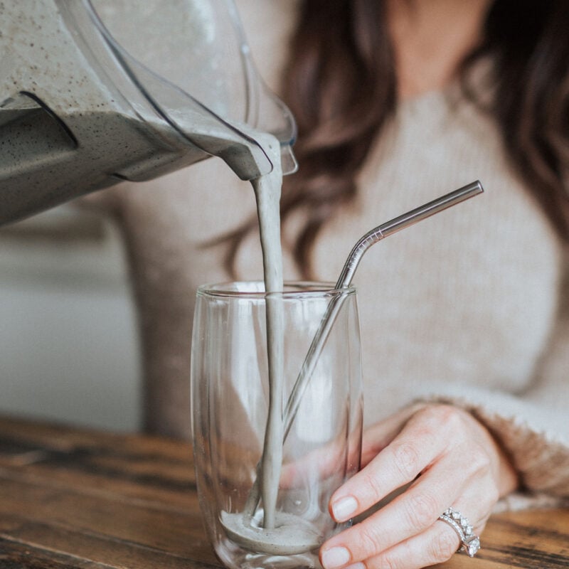 Kelly LeVeque pouring protein smoothie