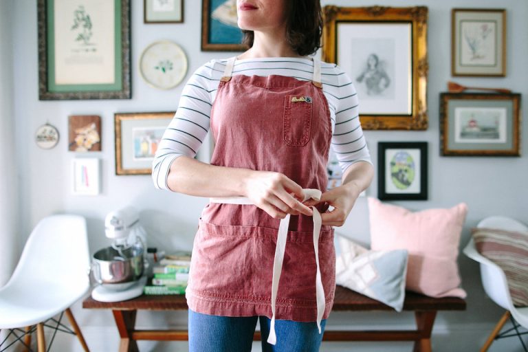 Designate yourself as the hostess with a special apron.