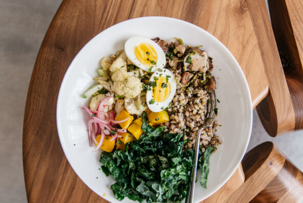 warm farro bowl with roasted cauliflower and kale
