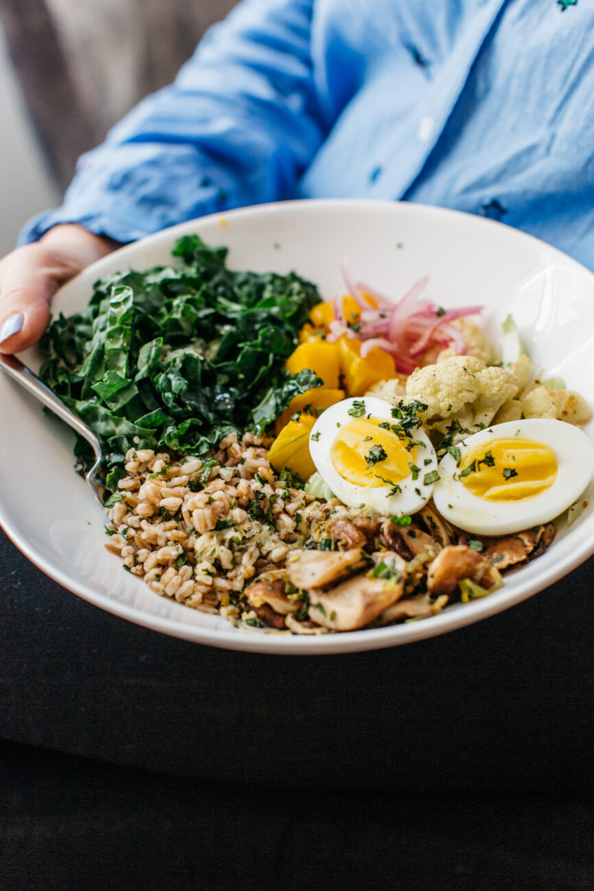 warm farro bowl with roasted cauliflower and kale