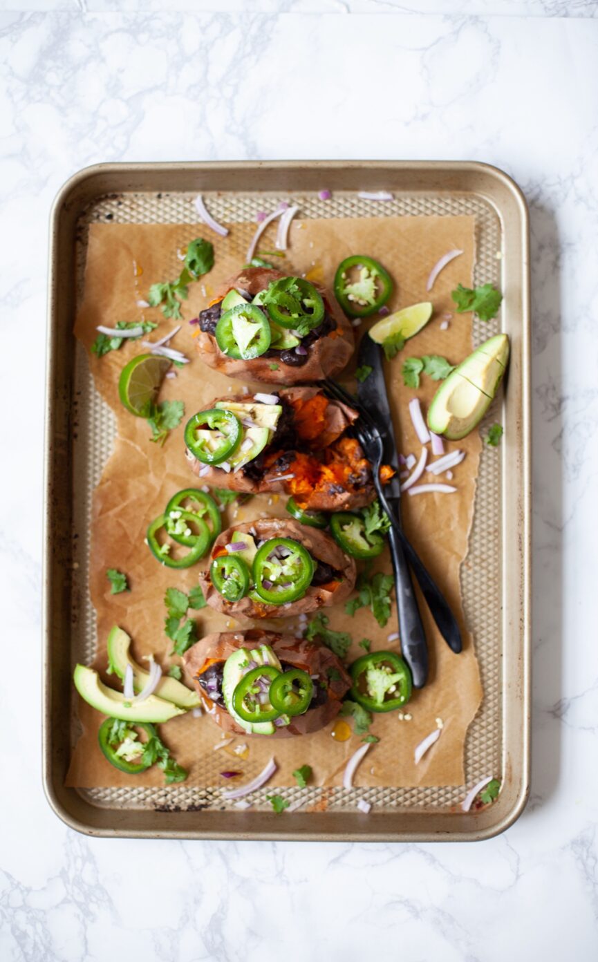 spicy stuffed sweet potatoes baking sheet