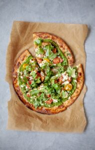 cauliflower crust pizza with pesto and goat cheese