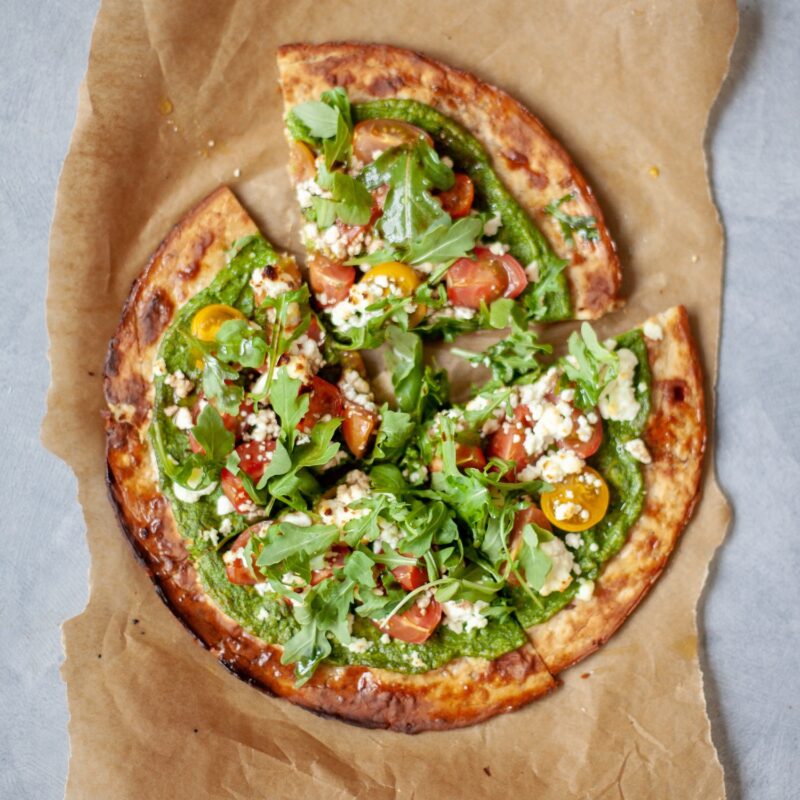 cauliflower crust pizza with pesto and goat cheese