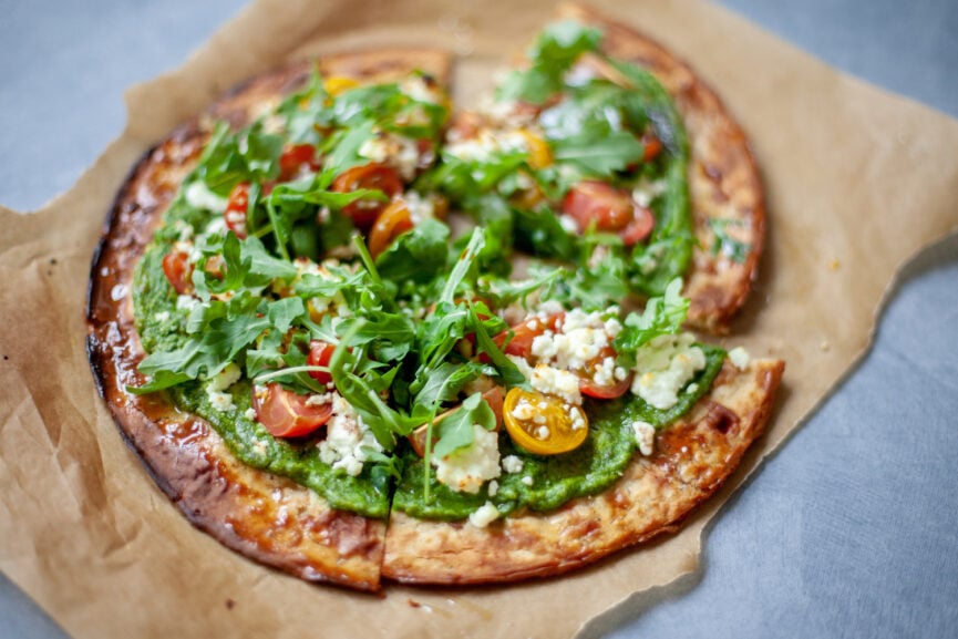 cauliflower crust pizza with pesto and goat cheese
