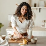 Woman making golden milk