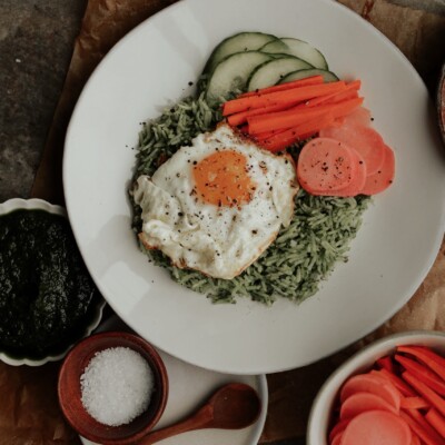 herby kale rice bowl with pickled veggies and a fried egg