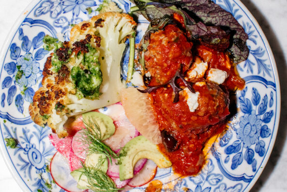 spicy lamb meatballs in tomato sauce with ricotta