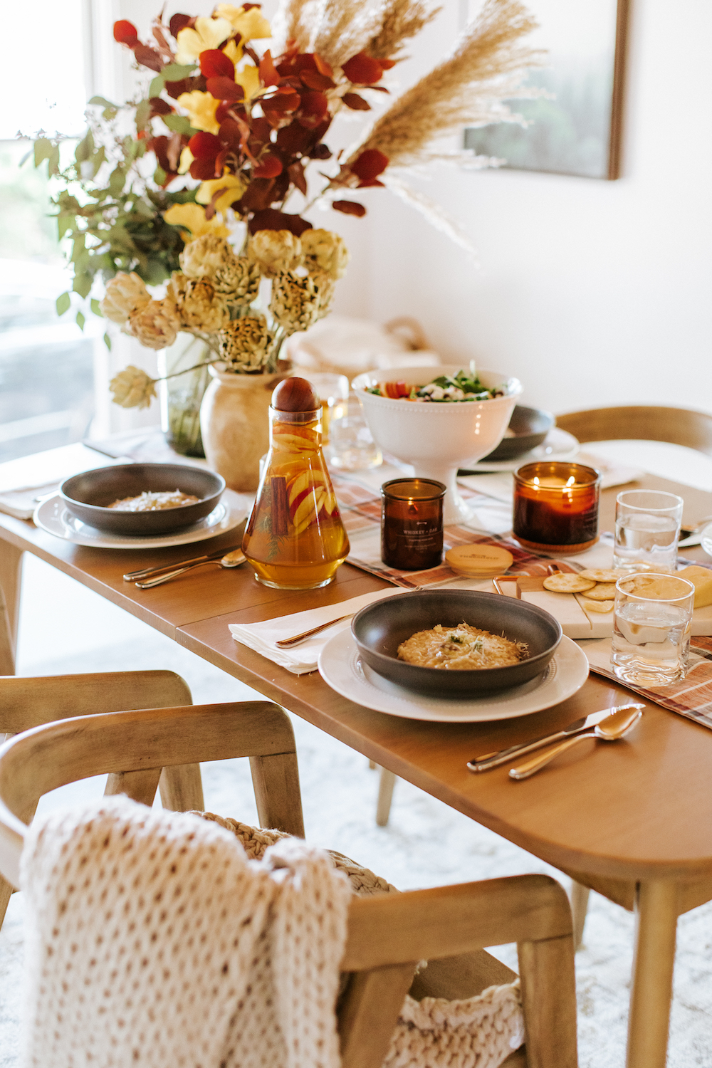 fall table with faux fall flowers and risotto and a simple menu with target
