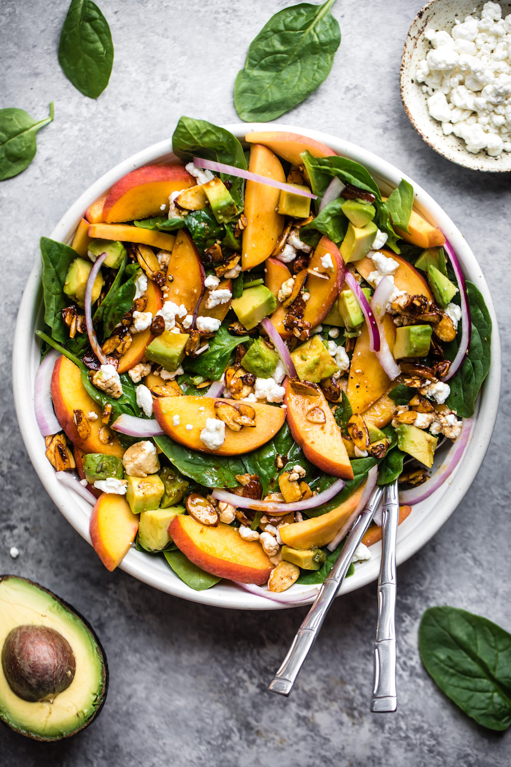 Summer Peach Spinach Salad With Avocado, Toasted Almonds + Goat Cheese 