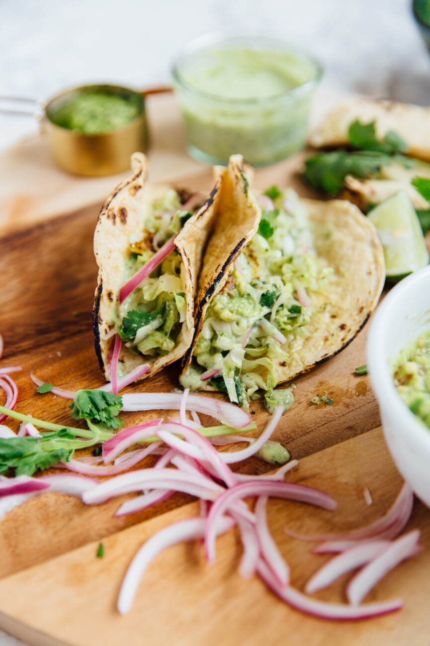 chimichurri fish tacos standing up