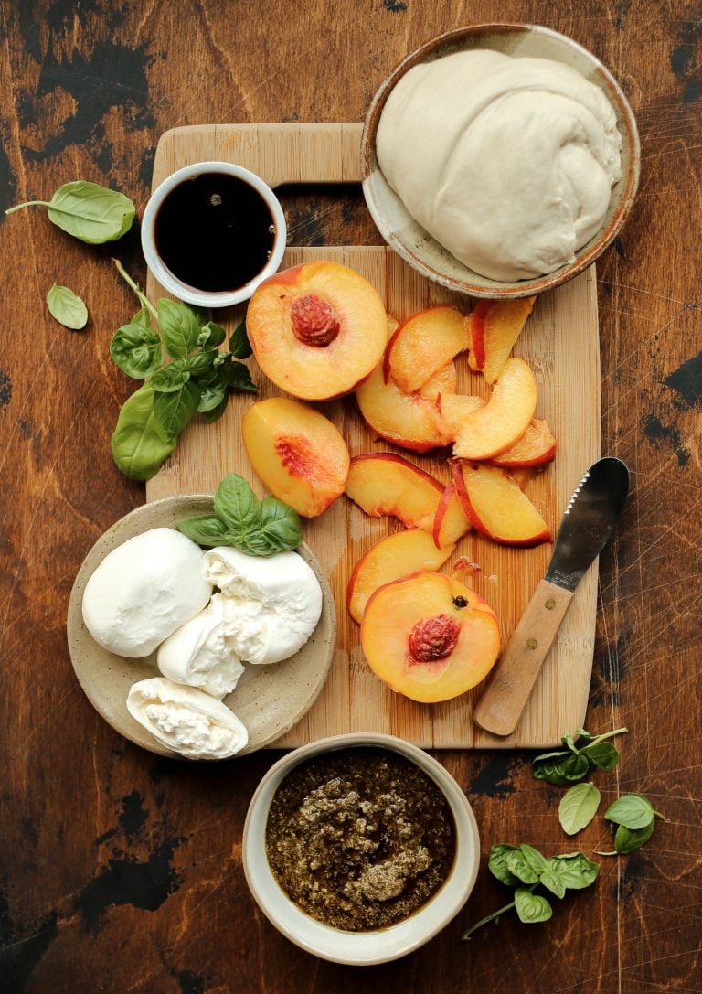 peach, basil, pesto, burrata, and balsamic pizza