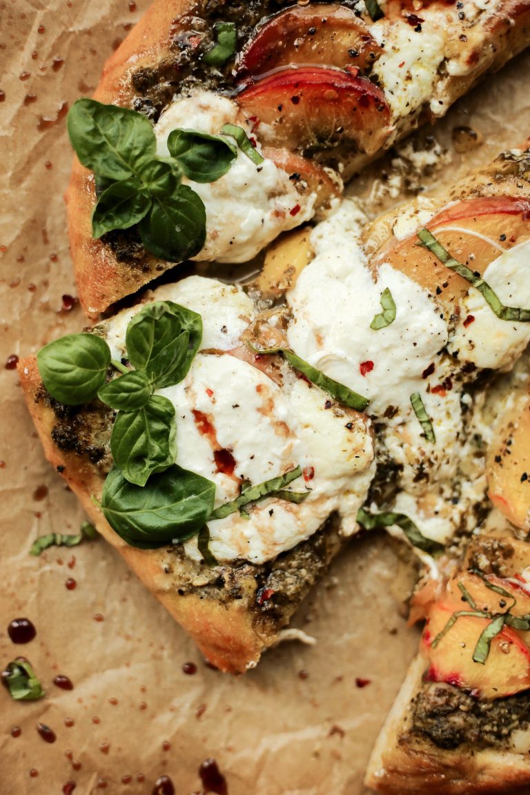 peach, basil, pesto, burrata, and balsamic pizza