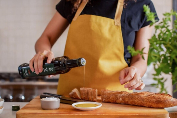 pouring olive oil on bread_canola oil vs olive oil